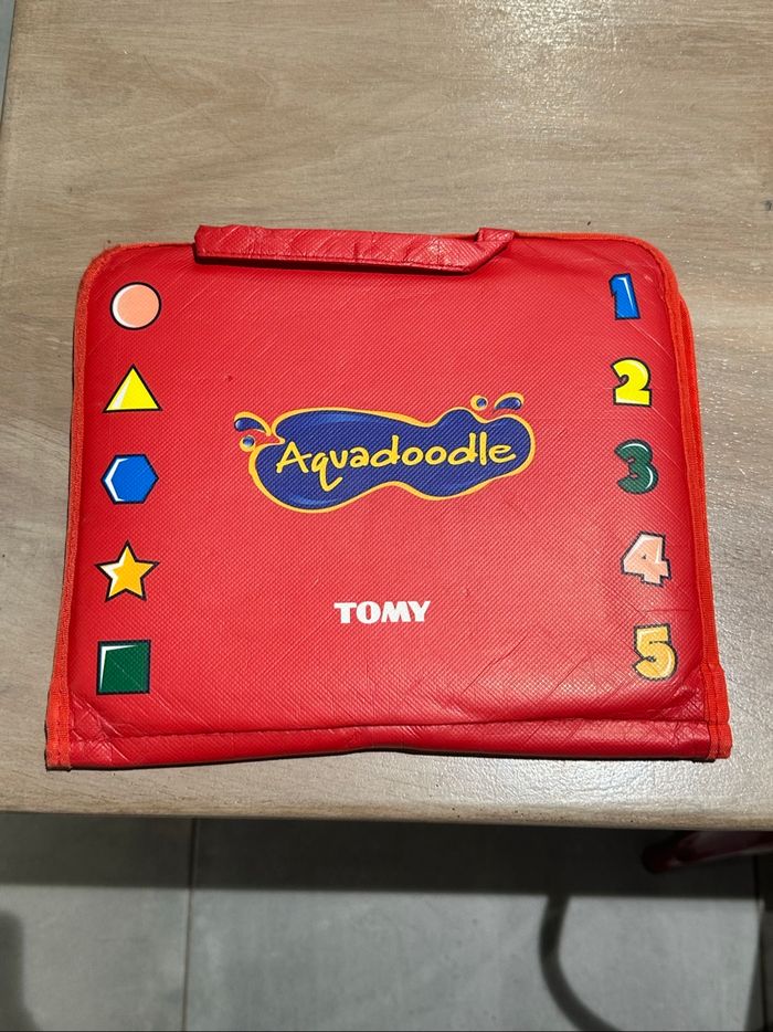 Lot aquadoodle et crayon craie grasse premier âge