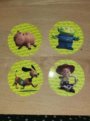 Lot de 4 pogs disney toys story