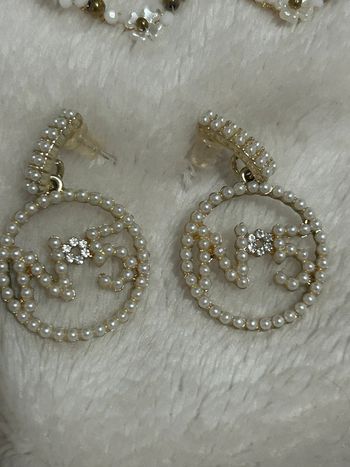 Boucles d oreilles acier dorée neuves