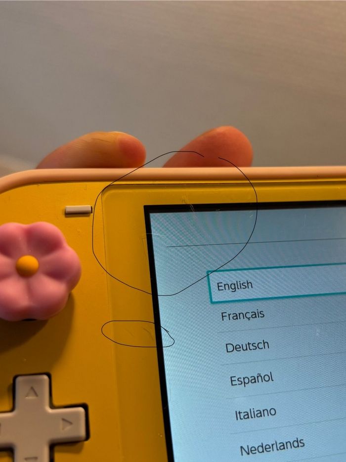 Console Nintendo Switch lite avec jeux et chargeur - photo numéro 4