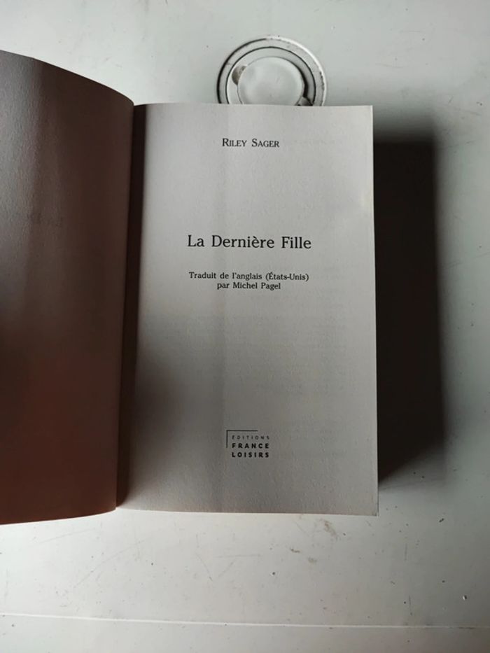 Livre la dernière fille - photo numéro 3