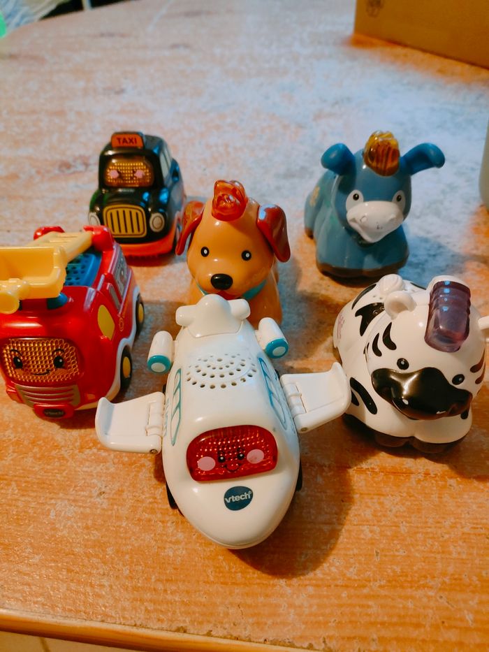 Lot Vtech la niche des surprises + 3 tut tut bolides + 3 tut tut animaux+ do ré mi mon baby baladeur - photo numéro 2
