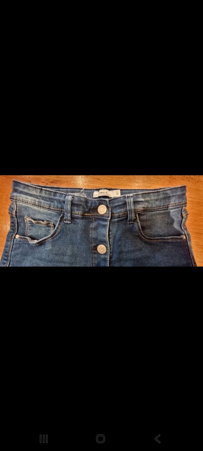 Jolie jupe courte denim  taille 10 ans - photo numéro 2