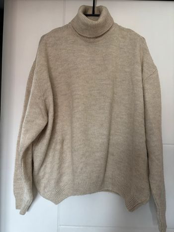 Pull large plutôt épais