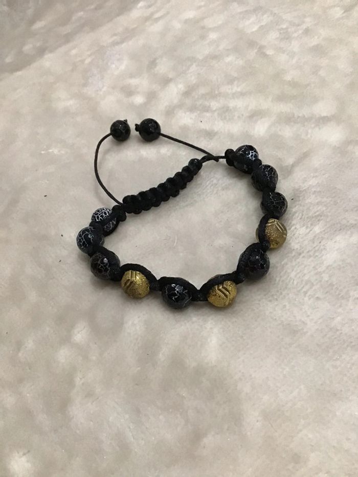 Joli bracelet cordon porte-bonheur