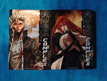 Tome 1 et 2 du mangas Omega Complex