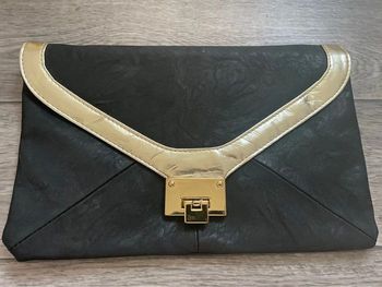 Sac pochette Asos noir et doré NEUF