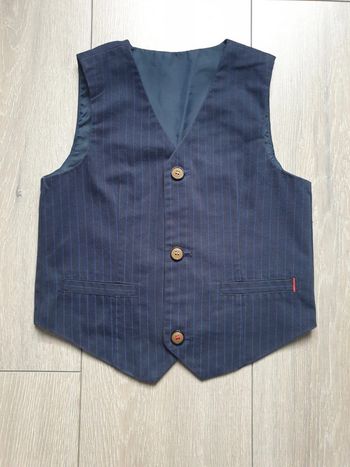 Bolero bleu a rayures. Garçon 6 ans