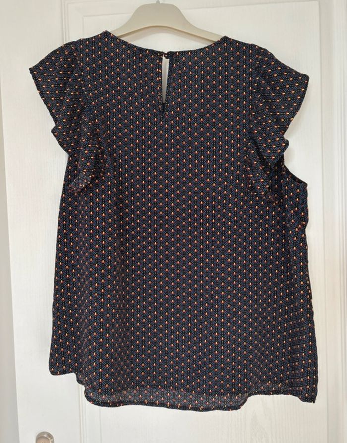 Blouse bleu marine à motifs jaunes, rouges et noirs - photo numéro 3