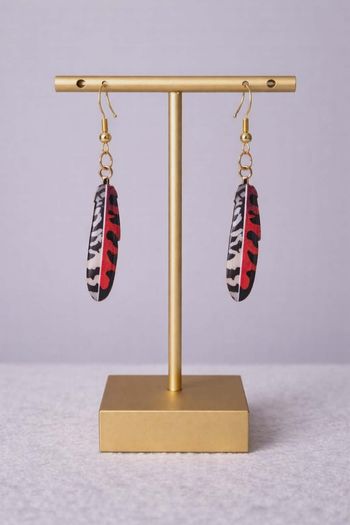 Boucle d'oreille pendentif doré 