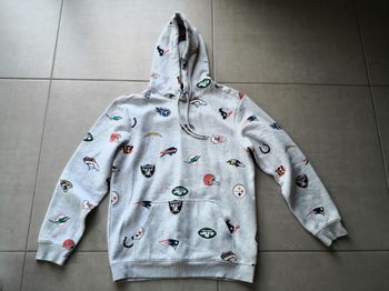 Sweat à capuche gris clair NFL comme neuf.