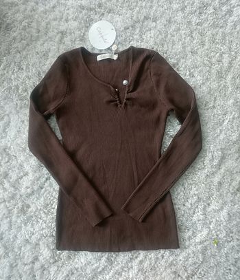 Pull capsule marron en taille M/L