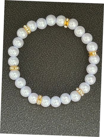 Bracelet mauve et doré en perles taille unique jamais porté