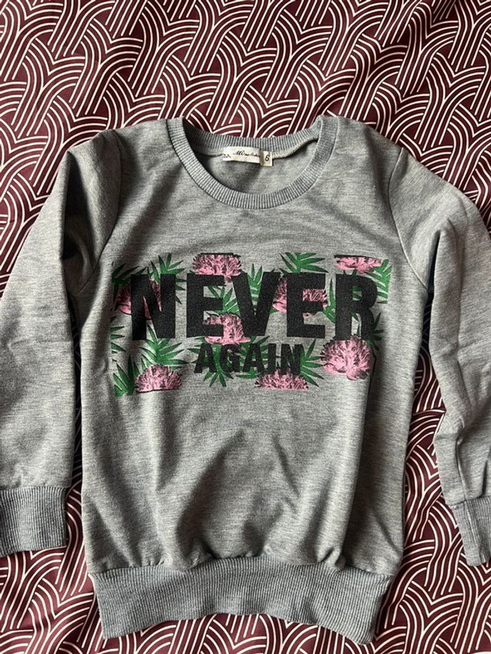 Pull gris fleur never Alain taille 6 ans