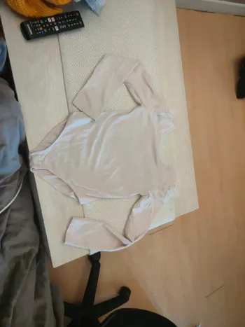 Body rose pâle avec tulle tao 12 ans