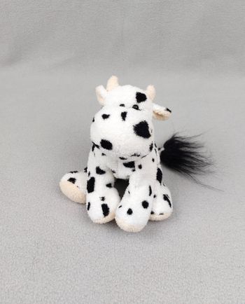 Peluche doudou petite vache blanc noir beige éponge 20 cm