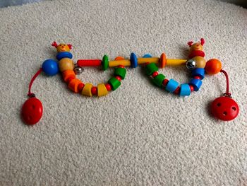 Arche/mobile en bois pour poussette 