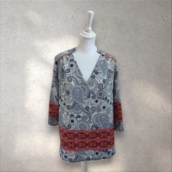 Blouse fluide à motifs décolleté en v taille M