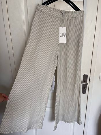Pantalon coupe large « wide » stradivarius 