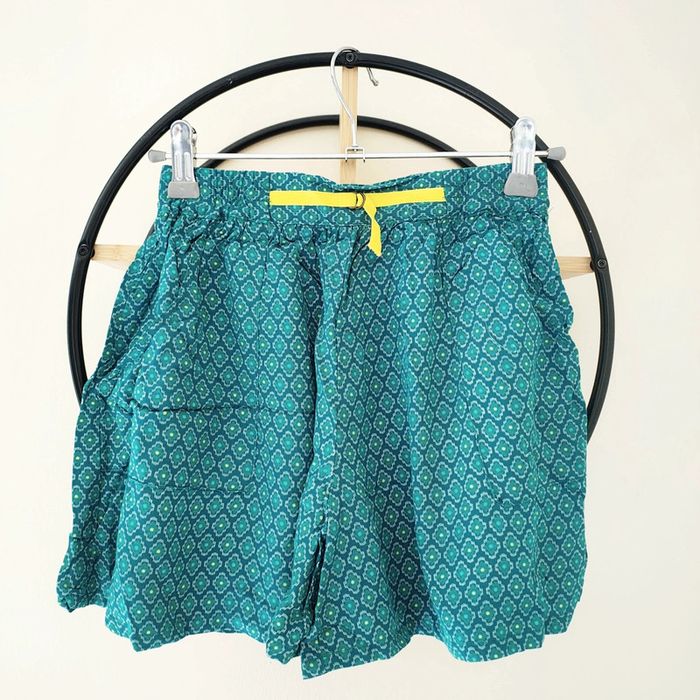 7 ans short fluide Okaïdi ( attention taille grand)