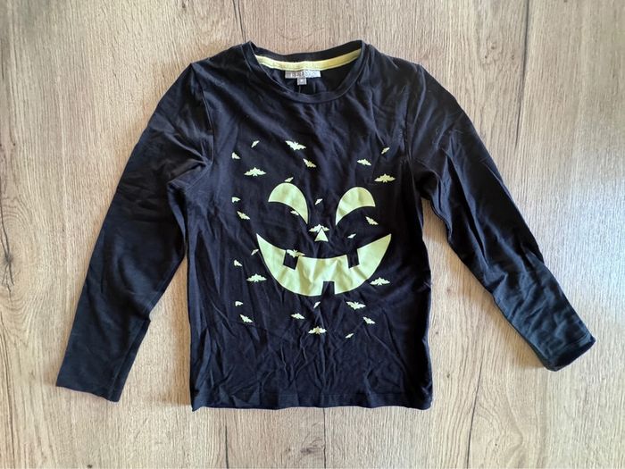 Tee shirt phosphorescent eldys taille 8 ans comme neuf