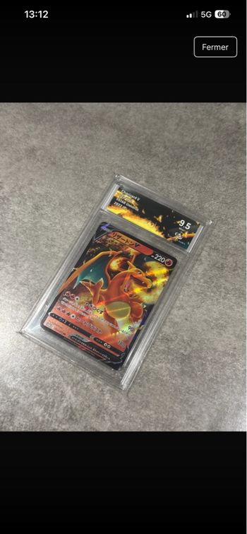 carte Pokémon dracaufeu gradé 9.5