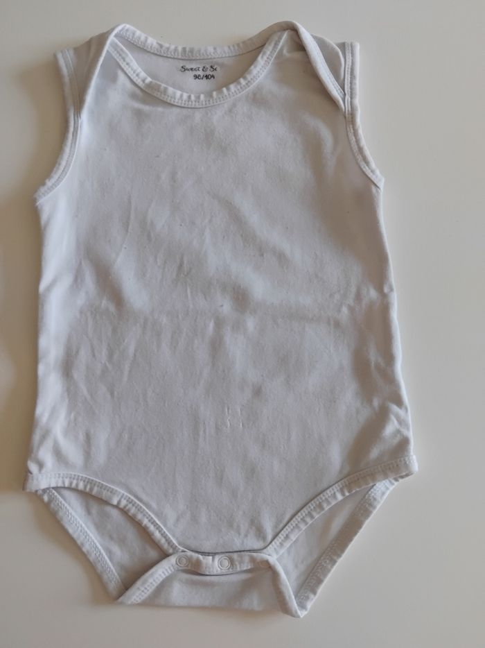 Bodi blanc manches courte 3 ans.