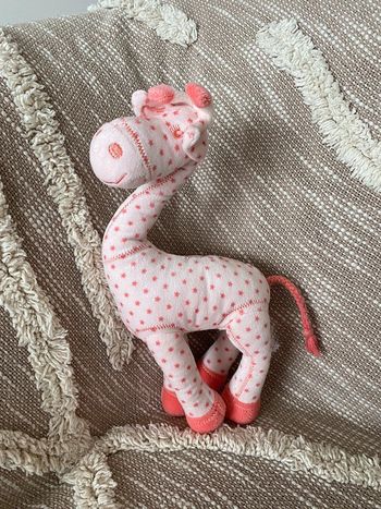 Peluche doudou Tape à l’œil girafe blanche et rose très bon état