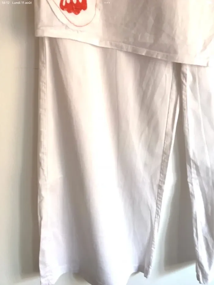 Pantalon large blanc Fashion Express 12 ans avec papillon orange sur le côté - photo numéro 2