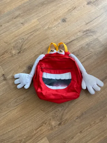 🔥 Sac à dos McDonald’s monstre rouge – Collector vintage 2012 – Rare 🔥