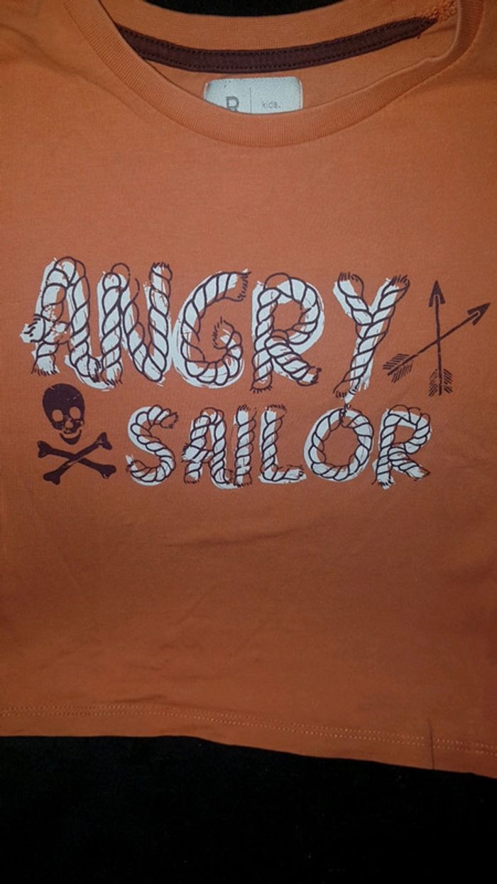 Tee-shirt manche courte orange impression pirates 3 ans
