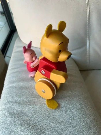 Jouet d’éveil Winnie tire porcinet