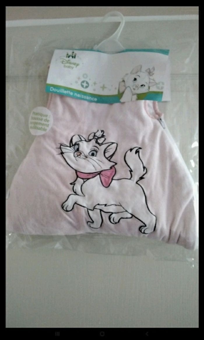 Gigoteuse (turbulette) aristochats, très bon état, dans housse de protection