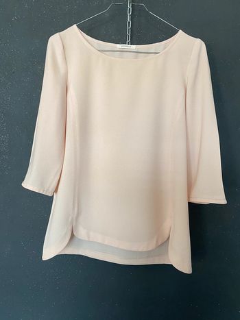 Blouse rose pâle manches à details