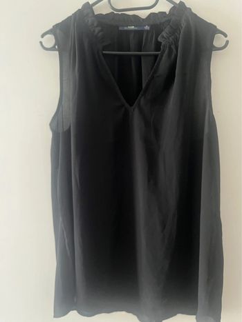 Blouse noire sans manches taille M