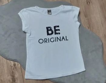 Tee-shirt tape à l'oeil blanc/noir "be original" 6 ans en très bon état