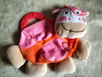 Peluche vache Chicco rose et orange