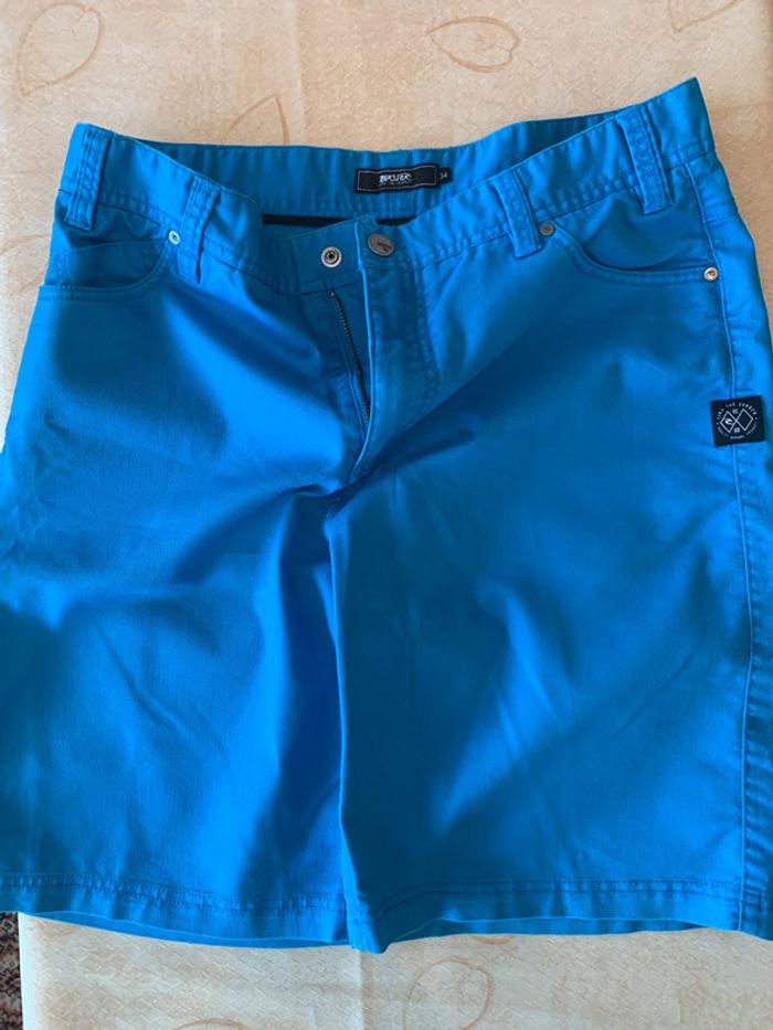 short bleu hommes taille 34/L Rip curl