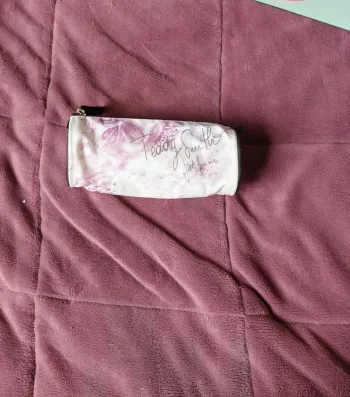 Trousse teddy Smith blanche et lila/violet à fleur