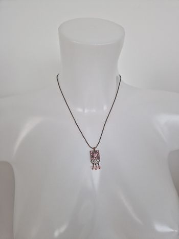Collier avec motif et perles rose