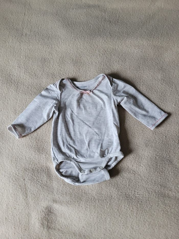 Body H&M conscious 56 cm