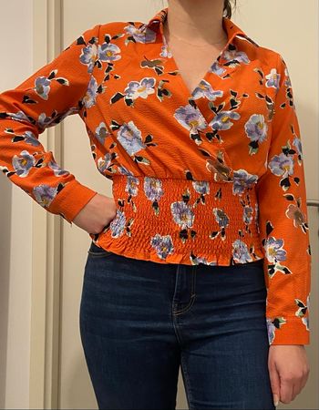 Blouse orange fleurie