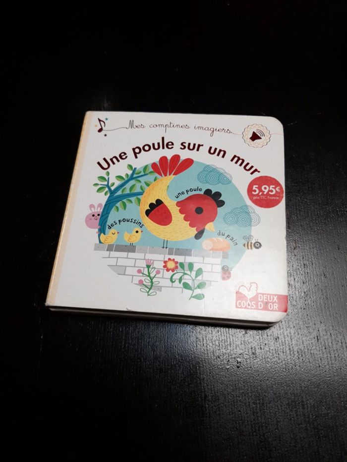 Livre sonore musical comptines une poule sur un mur