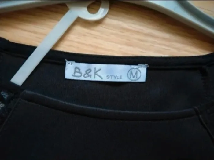 Robe courte. Noire. Femme . B&K style.
Taille M - photo numéro 8