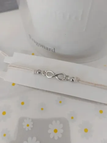 Bracelet cordon écru infinity