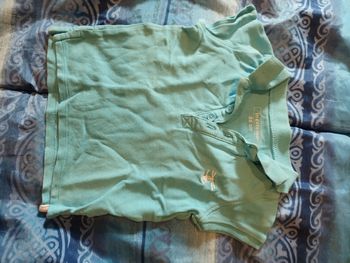 Polo bleu dessin hélicoptère