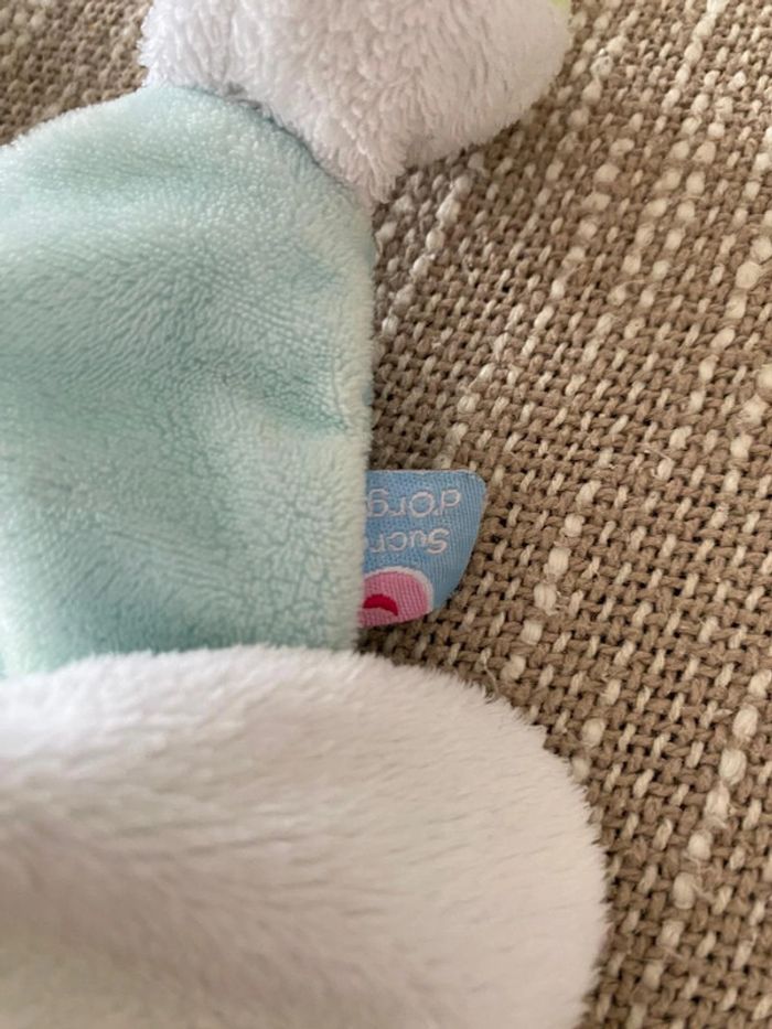 Peluche doudou plat 25cm sucre d’orge lapin bleu et blanc très bon état - photo numéro 4