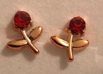 Boucles d’oreilles avec fleur (roses)