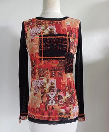 Haut taille 46/48 attention taille très petit, lire