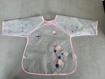 Bavoir plastique à manches